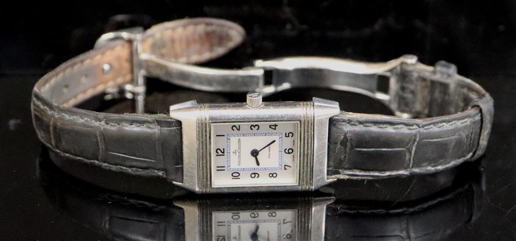 A ladys stainless steel Jaeger LeCoultre Reverso quartz wrist watch, on leather strap with Jaeger LeCoultre buckle,